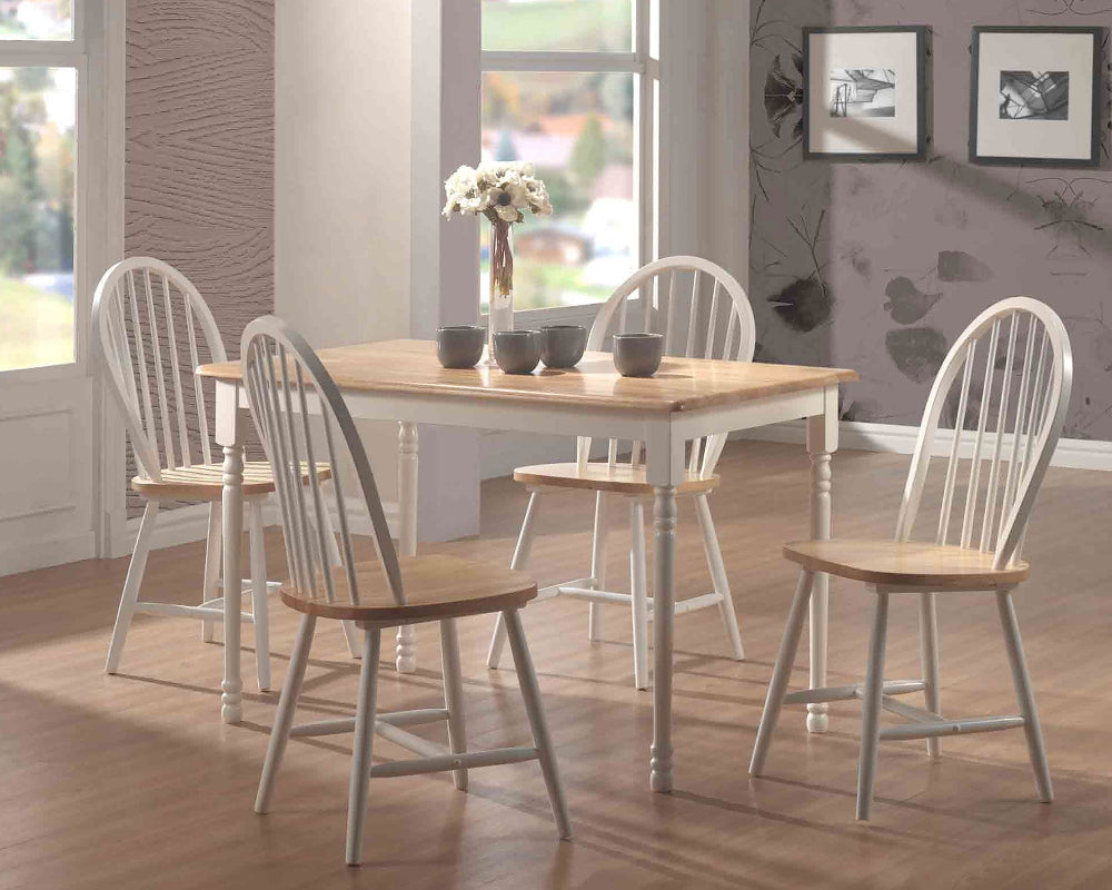 Dining room with wooden table and chairs near a window