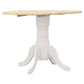 Round wooden table with white pedestal base on a white background