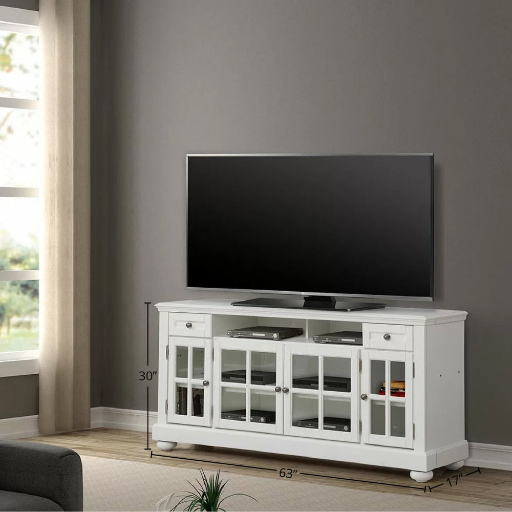 White TV stand with a black television in a living room setting. with dimensions