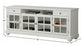 White entertainment console with glass doors and dimensions on a white background