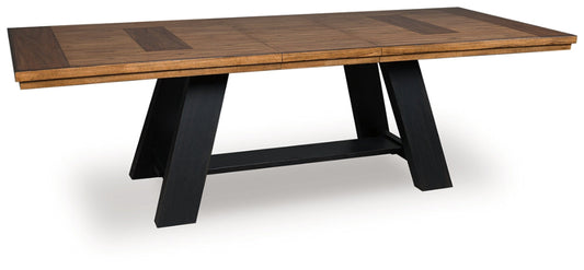Wooden dining table with black metal legs on a white background