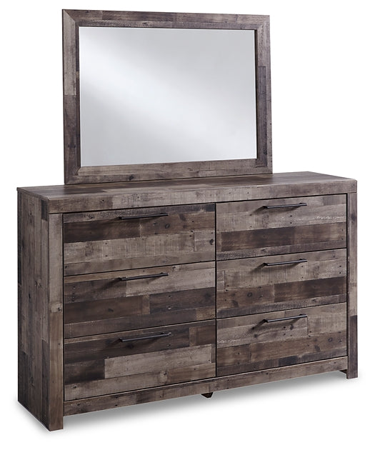 Wooden dresser with mirror on a white background
