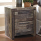 Wooden nightstand with two drawers in a room setting