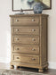 Feddinger King Panel Bed with Mirrored Dresser, Chest and Nightstand