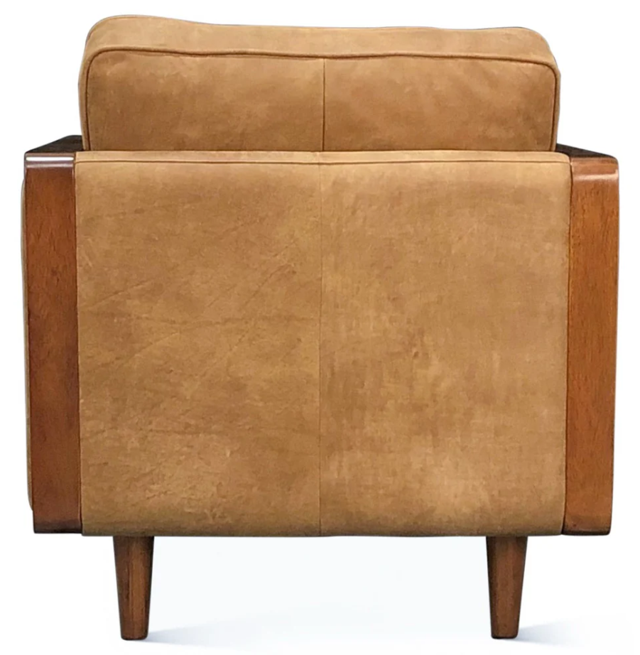 Brown leather armchair on a white background