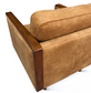 Brown leather arm chair on a white background