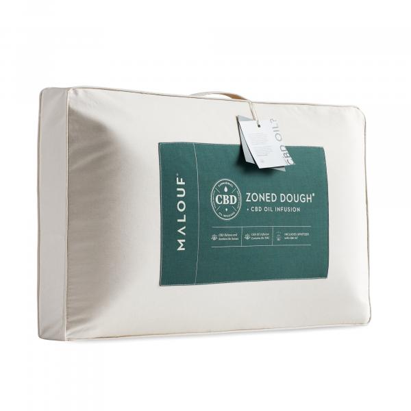 CBD Zoned Dough pillow with a natural cotton cover and a label indicating it is infused with CBD oil.